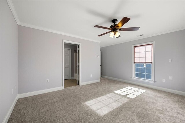 unfurnished bedroom with ceiling fan, light carpet, and ornamental molding