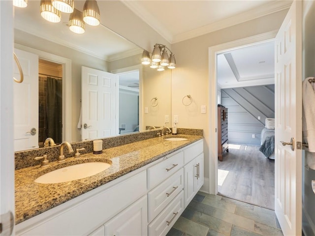 bathroom with vanity and ornamental molding