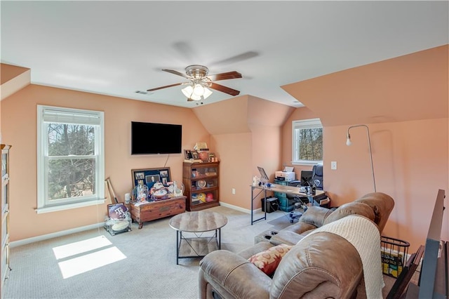 living room with visible vents, a ceiling fan, carpet flooring, baseboards, and vaulted ceiling