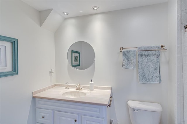 full bath featuring recessed lighting, toilet, and vanity