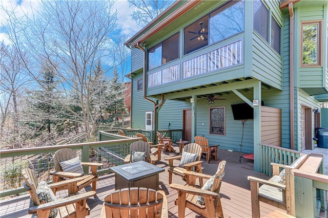 deck with an outdoor fire pit