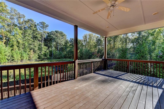 wooden deck with ceiling fan