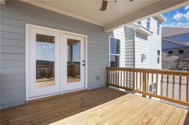 deck featuring french doors and a ceiling fan