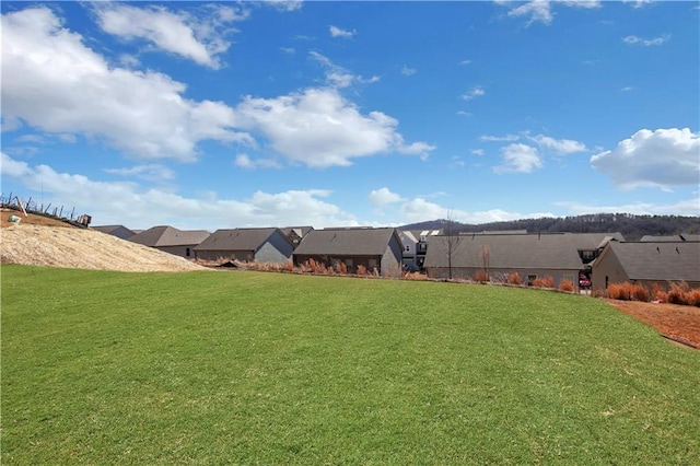 view of yard with a residential view