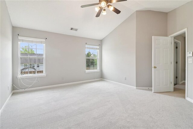 unfurnished room with carpet floors, ceiling fan, visible vents, and baseboards