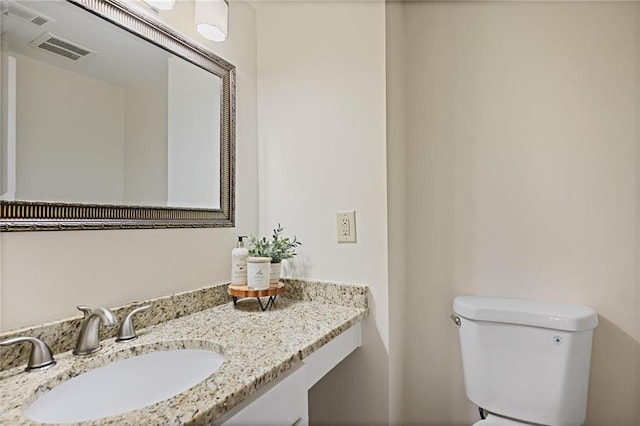 2117 Bucktrout Pl, Dunwoody, GA 30338 - bathroom featuring toilet and vanity
