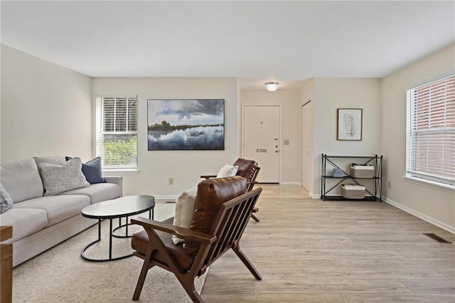 2117 Bucktrout Pl, Dunwoody, GA 30338 - living area with light wood-type flooring and baseboards
