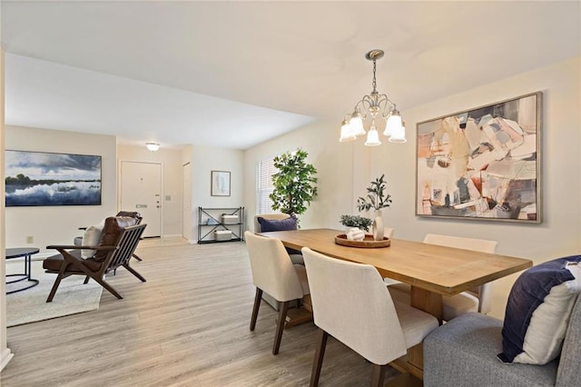 2117 Bucktrout Pl, Dunwoody, GA 30338 - dining room with light wood-style flooring, a chandelier, and baseboards