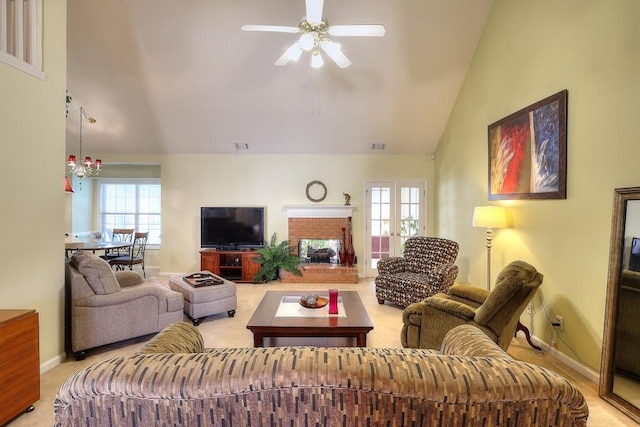 living area with carpet, french doors, ceiling fan, high vaulted ceiling, and baseboards