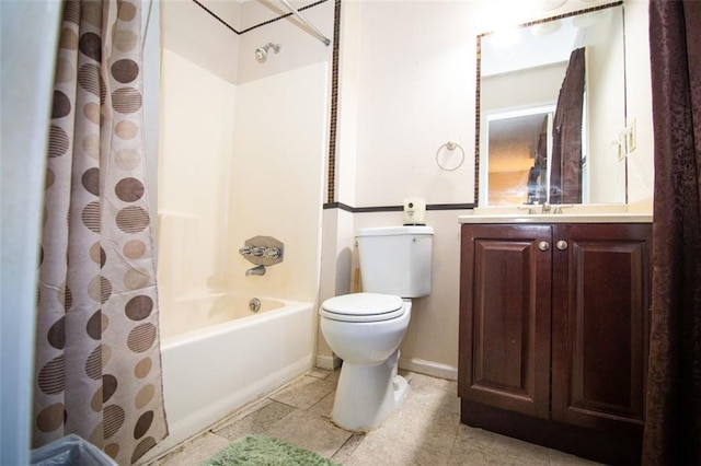 full bathroom with vanity, shower / tub combo with curtain, and toilet