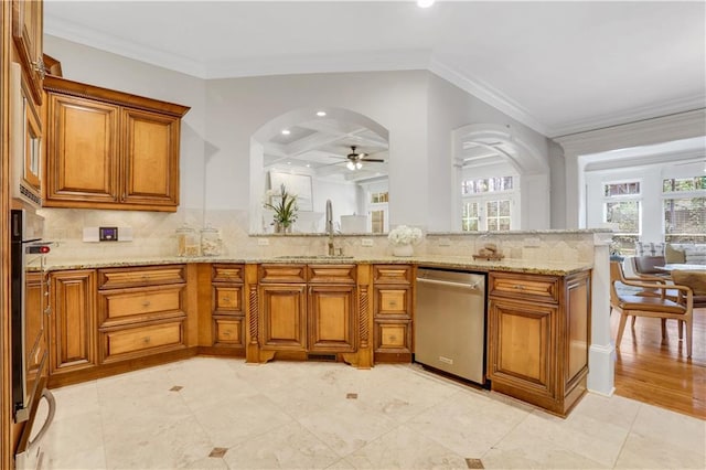 kitchen with dishwasher, ornamental molding, brown cabinetry, and a sink