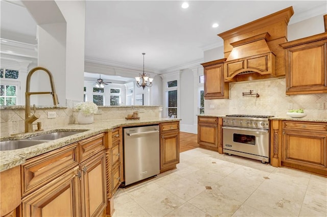 kitchen featuring ornamental molding, brown cabinetry, appliances with stainless steel finishes, and a sink
