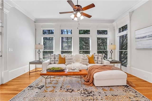 sunroom featuring ceiling fan