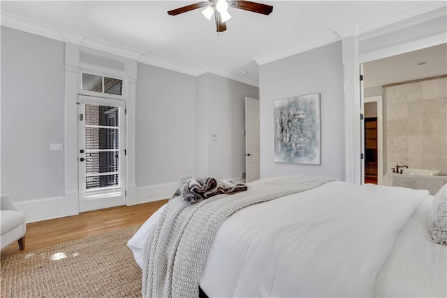 bedroom with a ceiling fan, wood finished floors, baseboards, crown molding, and access to outside