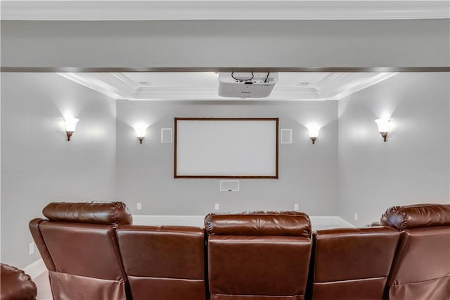 home theater featuring baseboards and ornamental molding