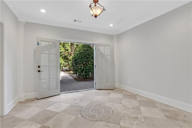 foyer entrance featuring visible vents, crown molding, baseboards, recessed lighting, and french doors