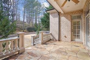 view of patio featuring ceiling fan