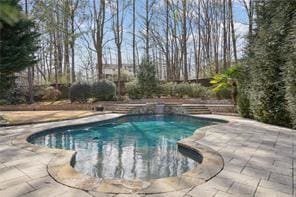 pool with a patio