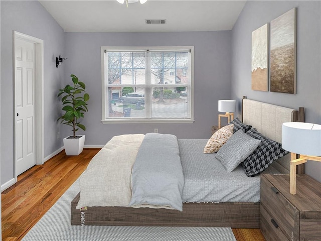 1649 Southgate Mill Dr, Duluth, GA 30096 - bedroom featuring wood finished floors and baseboards
