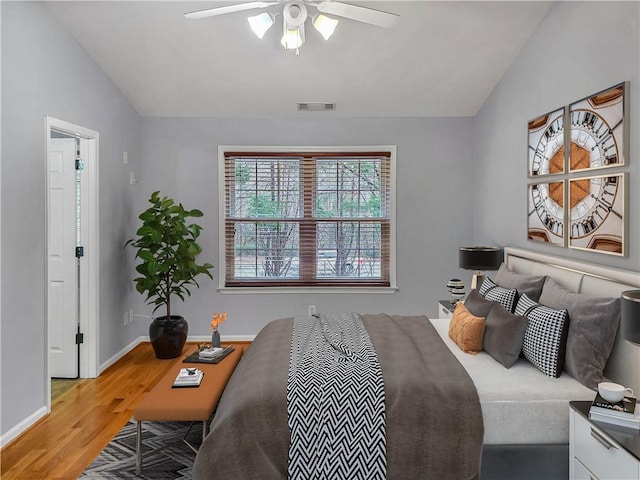 1649 Southgate Mill Dr, Duluth, GA 30096 - bedroom with wood finished floors, vaulted ceiling, baseboards, and ceiling fan