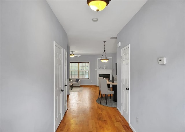1649 Southgate Mill Dr, Duluth, GA 30096 - hallway featuring light wood-style flooring, baseboards, and french doors
