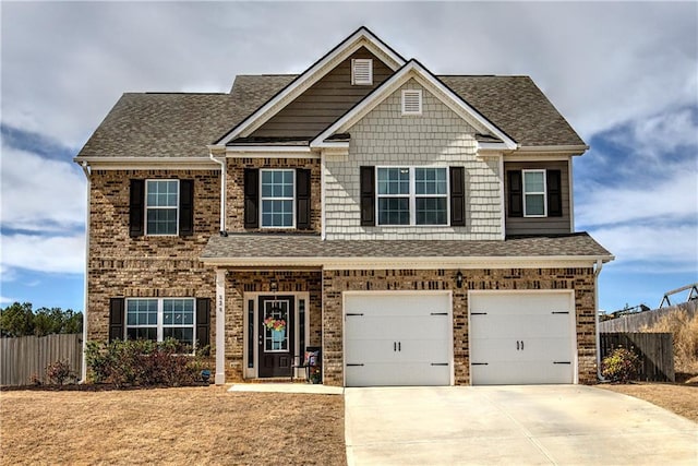 craftsman-style house with an attached garage, concrete driveway, roof with shingles, and fence