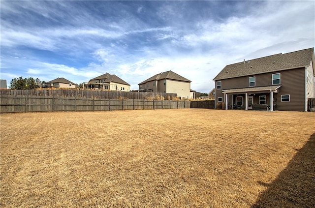 view of yard with fence