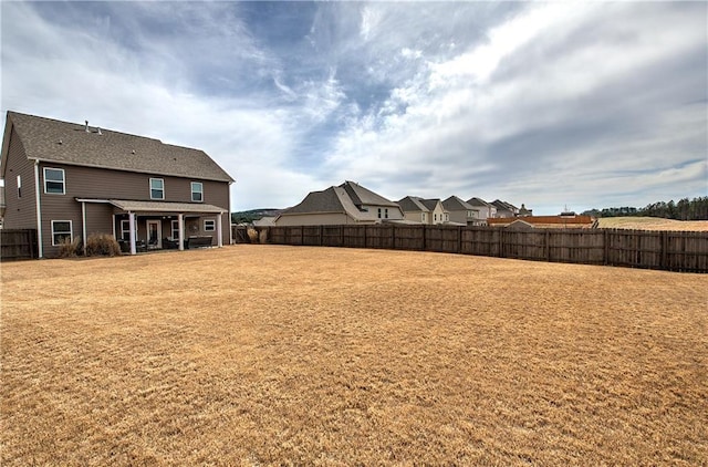 view of yard featuring a fenced backyard