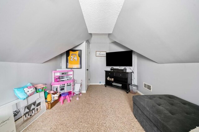 565 Saint James Ct, Lawrenceville, GA 30044 - game room featuring vaulted ceiling and carpet
