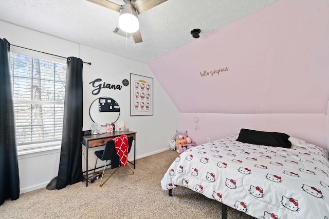 565 Saint James Ct, Lawrenceville, GA 30044 - carpeted bedroom featuring lofted ceiling, a textured ceiling, and ceiling fan