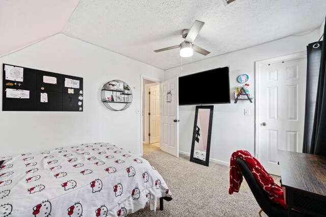 565 Saint James Ct, Lawrenceville, GA 30044 - carpeted bedroom featuring ceiling fan, a closet, and a textured ceiling