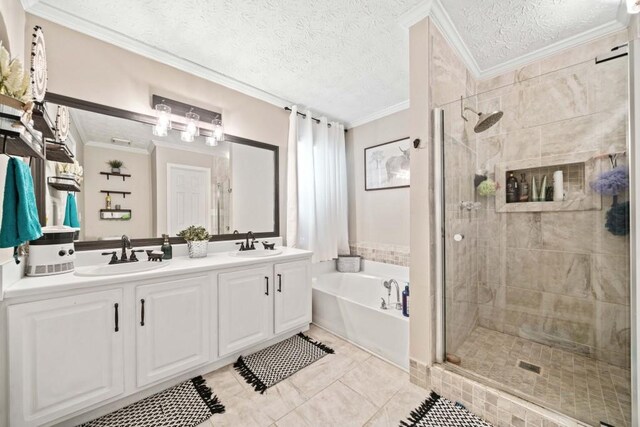 565 Saint James Ct, Lawrenceville, GA 30044 - bathroom with a textured ceiling, ornamental molding, vanity, independent shower and bath, and tile patterned flooring