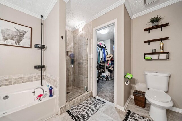 565 Saint James Ct, Lawrenceville, GA 30044 - bathroom featuring plus walk in shower, crown molding, a textured ceiling, and toilet