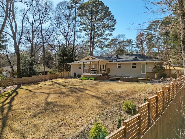 back of property with fence private yard