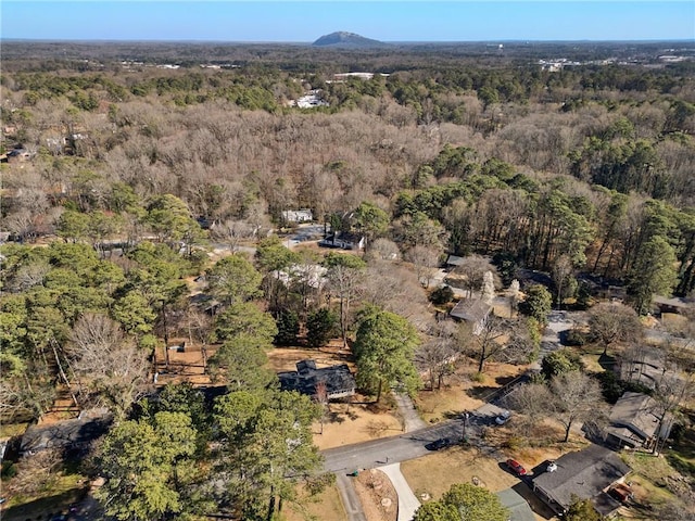 drone / aerial view with a view of trees