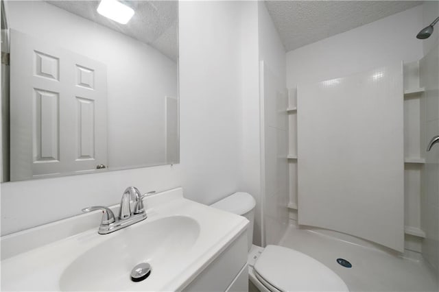 68 Wagon Trail Cir, Dallas, GA 30132 - full bath with a textured ceiling, a shower stall, and vanity