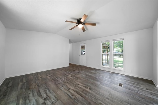 68 Wagon Trail Cir, Dallas, GA 30132 - unfurnished living room with a ceiling fan, dark wood finished floors, and lofted ceiling