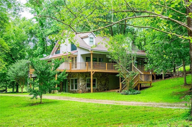 1775 Whooping Creek Rd, Carrollton, GA 30116 - back of house featuring stone siding, a yard, a wooden deck, and stairs