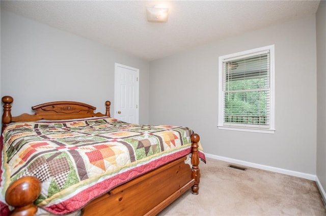 1775 Whooping Creek Rd, Carrollton, GA 30116 - bedroom featuring light colored carpet and baseboards