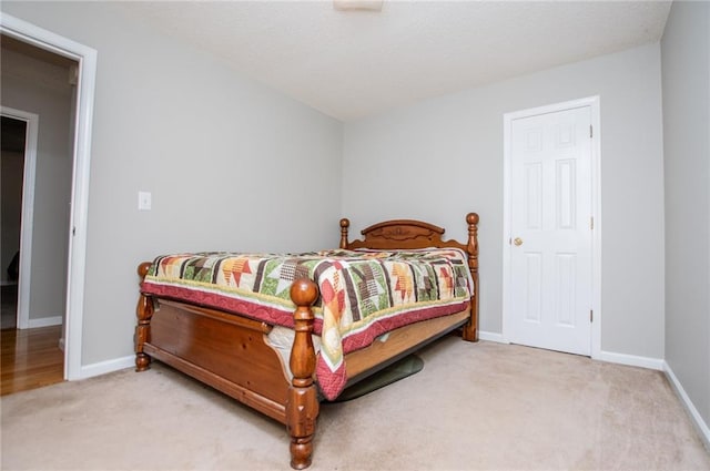 1775 Whooping Creek Rd, Carrollton, GA 30116 - carpeted bedroom featuring baseboards