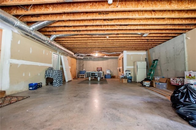 1775 Whooping Creek Rd, Carrollton, GA 30116 - unfinished basement featuring freestanding refrigerator