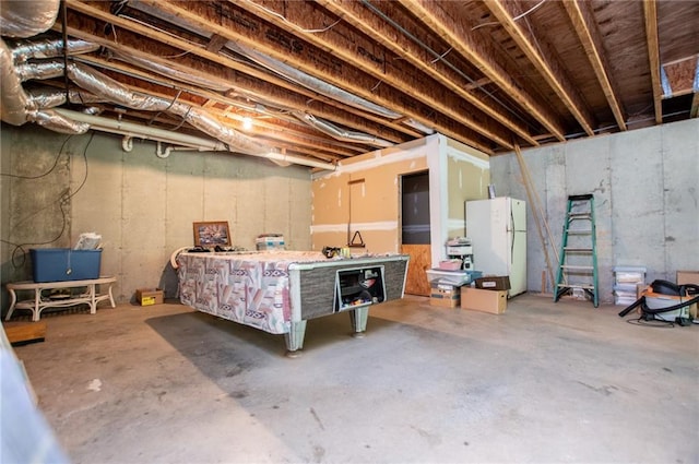 1775 Whooping Creek Rd, Carrollton, GA 30116 - unfinished basement featuring freestanding refrigerator
