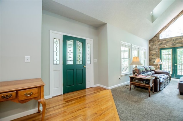 1775 Whooping Creek Rd, Carrollton, GA 30116 - entryway with light wood finished floors and high vaulted ceiling