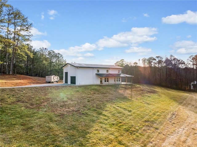 view of yard with a garage