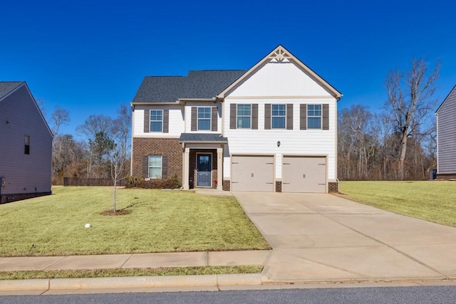 view of front facade with a garage and a front yard