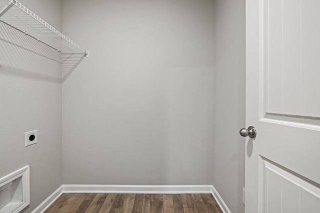 laundry room featuring dark hardwood / wood-style floors and hookup for an electric dryer