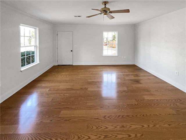 unfurnished room featuring hardwood / wood-style flooring and ceiling fan