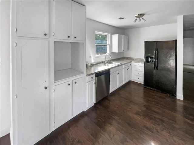 kitchen featuring sink, black fridge, white cabinetry, dark hardwood / wood-style floors, and dishwasher