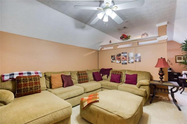 living room with a ceiling fan, visible vents, carpet, a textured ceiling, and lofted ceiling