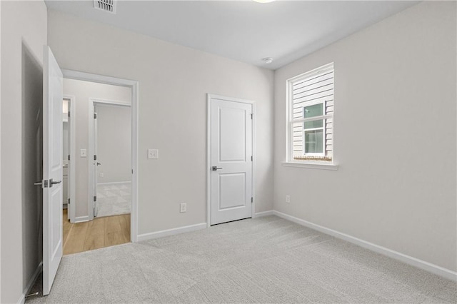 1682 Juniper Berry Way, Loganville, GA 30052 - unfurnished bedroom with carpet floors and baseboards